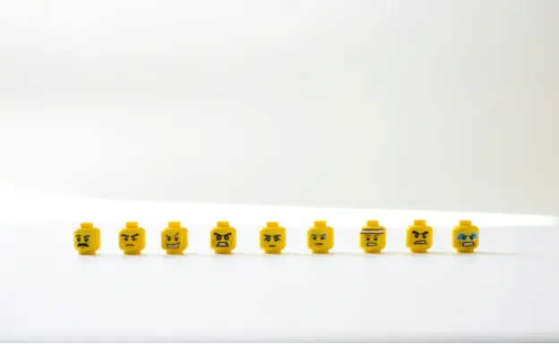 Lego heads with angry expressions 