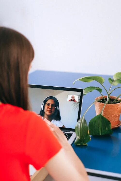 An image of a woman in an online therapy session