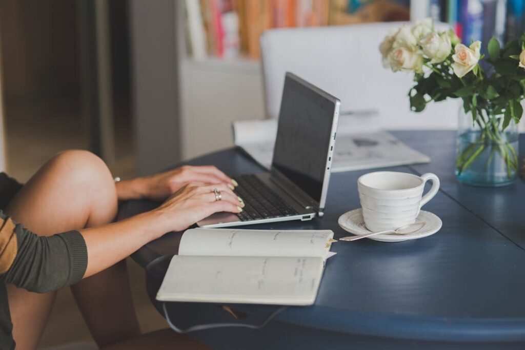 An image of a woman using her laptop