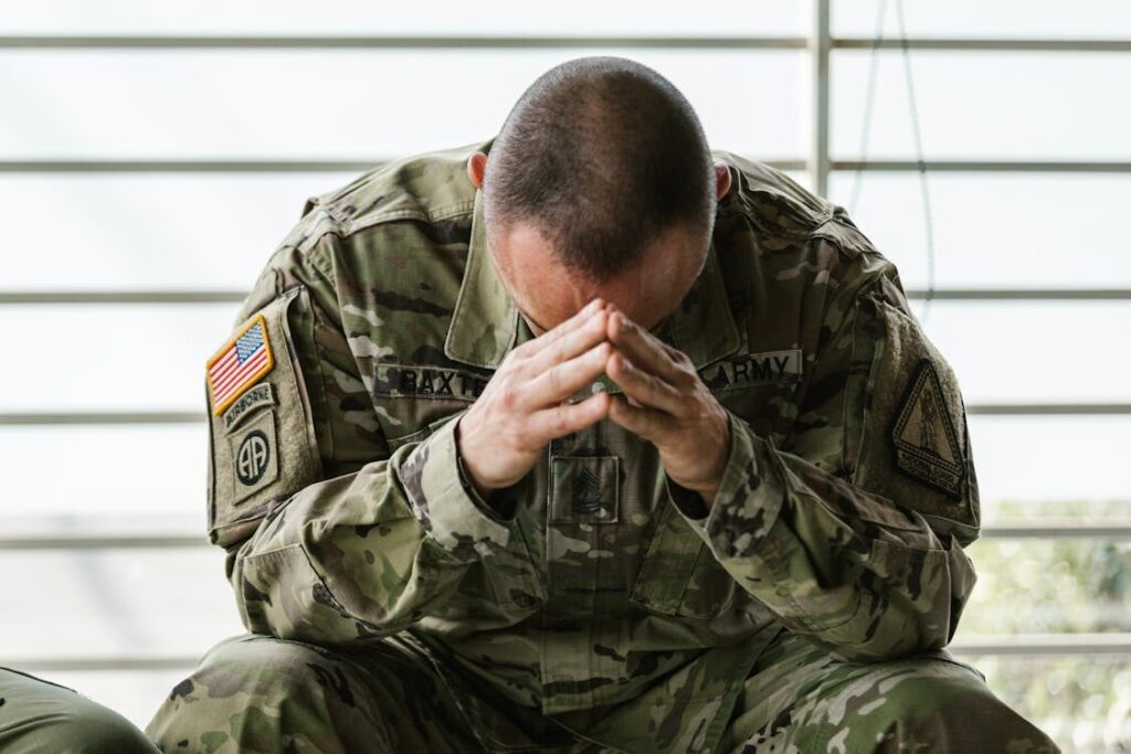 Stressed soldier coping with emotional trauma