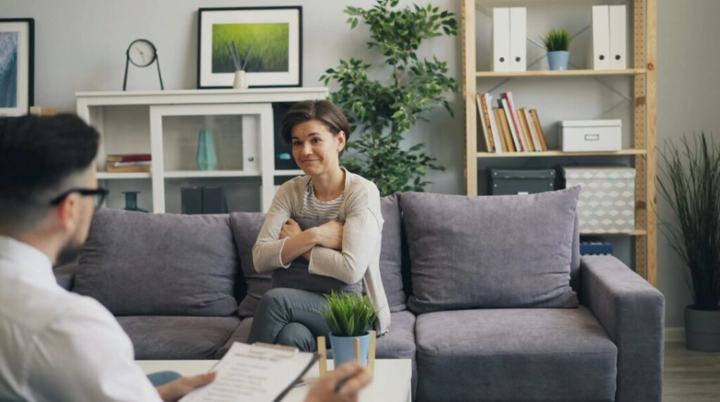 A woman speaking with a therapist.